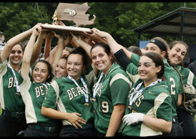 Holding up the trophy