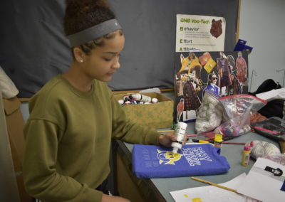 fashion design students working on a project