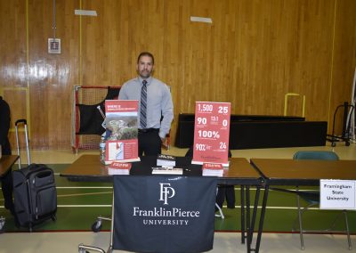 Advisor Standing At Franklin Pierce University Stand