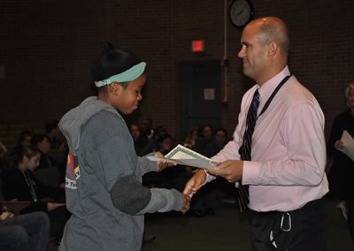 Student receiving renaissance award