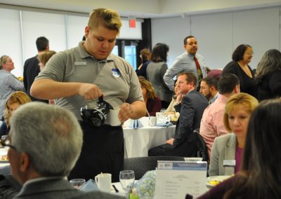 student serving coffee 4