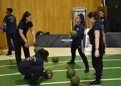 Legal students working with weight balls