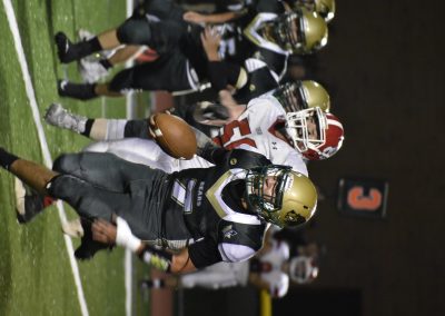 number 7 running towards touchdown