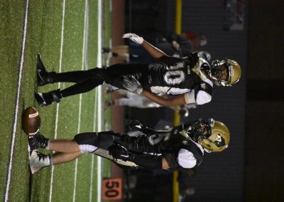 two voc players walking