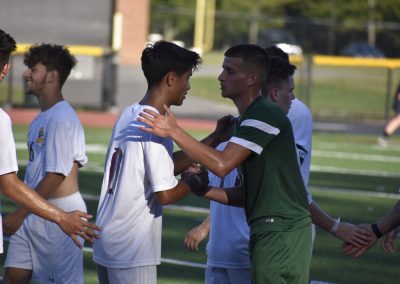 Students saying good game (Soccer)