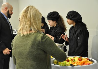 United Way Official Taking Fruits