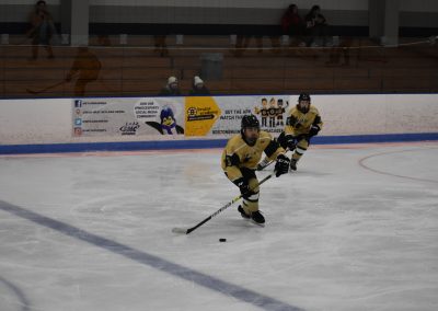 two voc players with puck