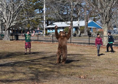 Participants playing frizbee