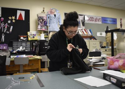 Student working on clothes