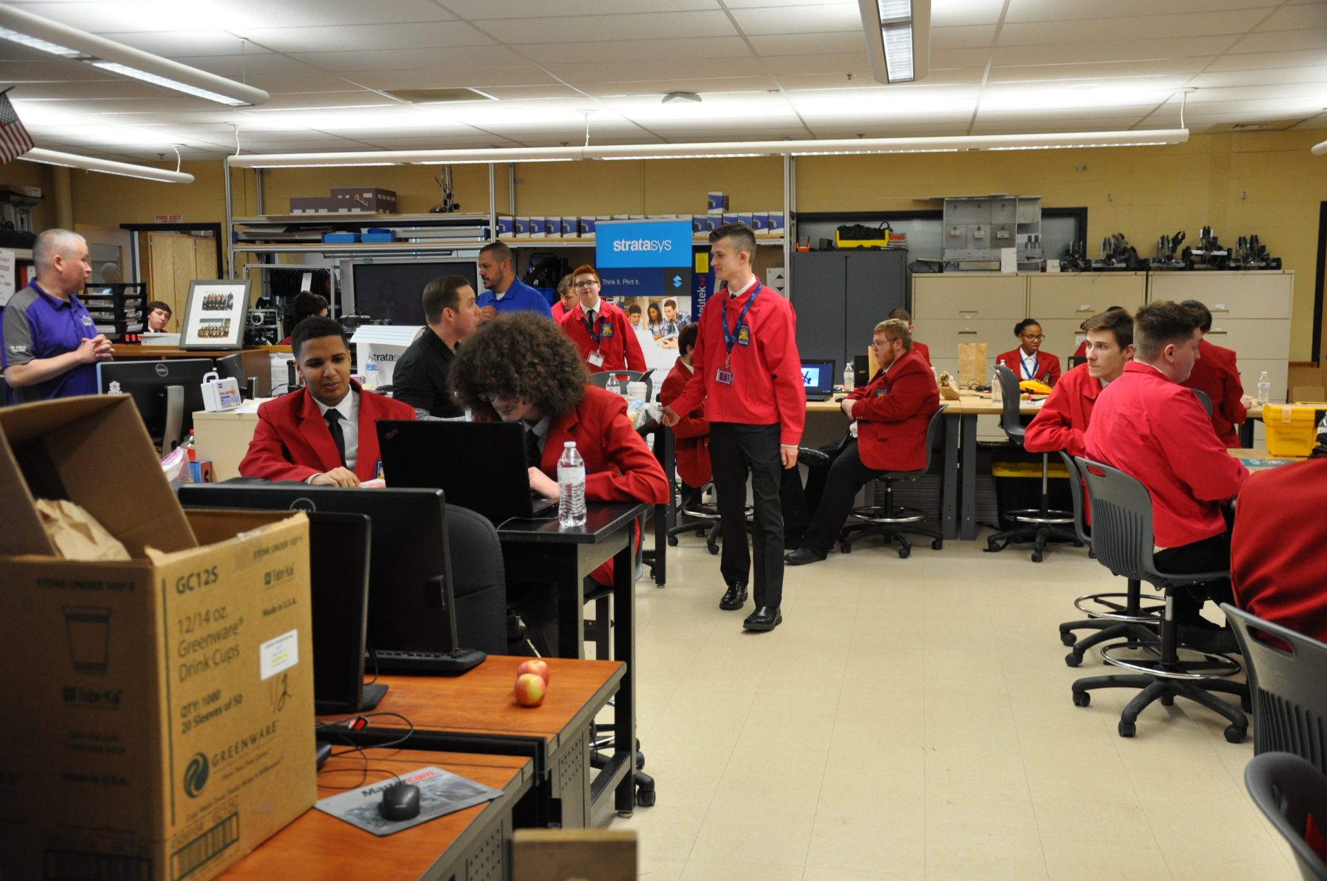 SkillsUSA students working together on computers