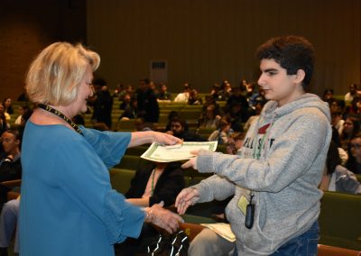 Renaissance Awards Ms. Bouley presenting a student an award