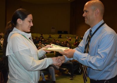 Renaissance Awards Mr. Viera gives a certificate