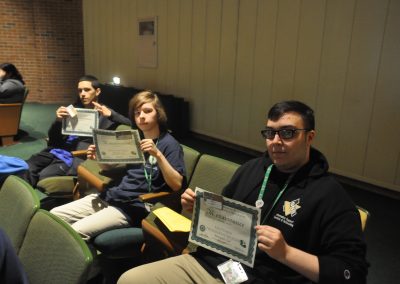 Three students with awards