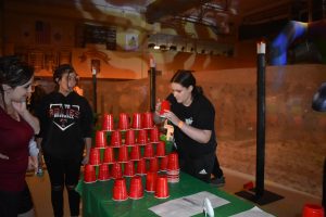 Student Stacking Cups during after prom