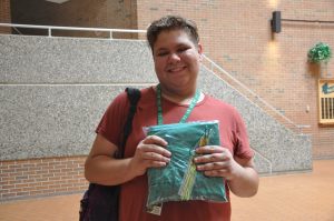 Student with Cap and Gown