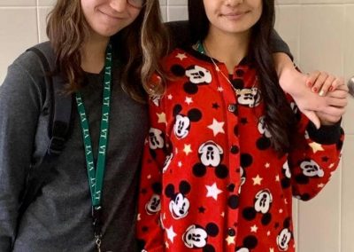 two students dressed up for pajama day