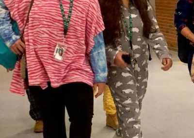 two students dressed up for pajama day