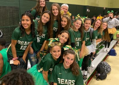 Lady bears on bleachers