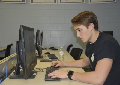 jack typing on computer