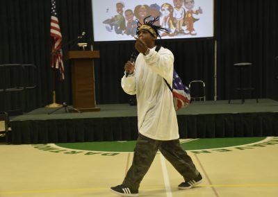Dr Brown walking to the audience