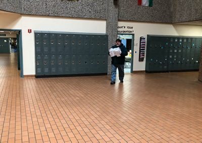GNBVT actsofkindess During Corona Virus Superintendant obrien carrying medical supplies in the hallways of GNBVT