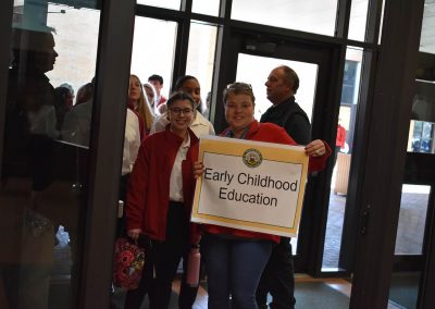 Early Childhood Education Group Walking Into Building
