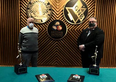 dave cowens award presenters and wearing masks
