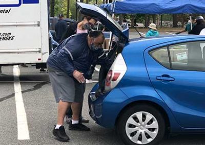 Man takes food out of his car