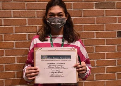 Student Taking Photo with Award 7