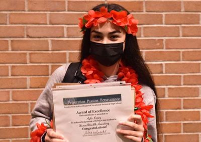 Student Taking Photo with Award 9