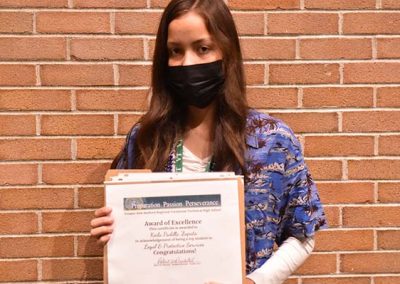 Student Taking Photo with Award 13