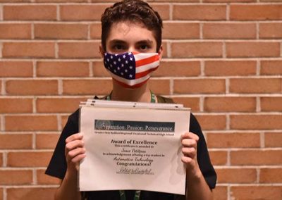 Student Taking Photo with Award 16