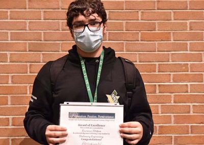 Student Taking Photo with Award 17
