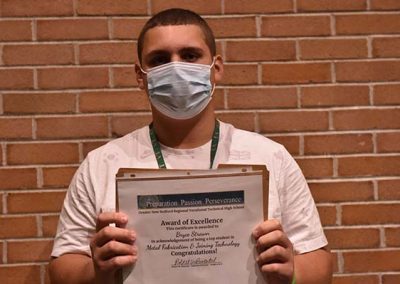 Student Taking Photo with Award 25