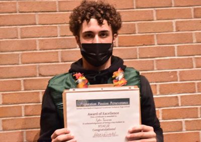 Student Taking Photo with Award 26