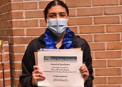 Student Taking Photo with Award 28