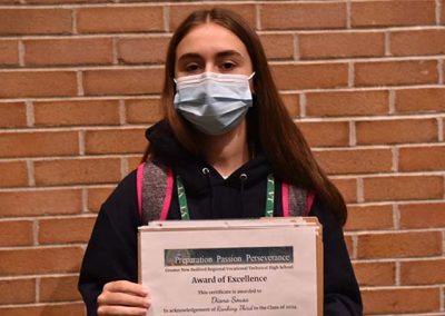 Student Taking Photo with Award 39