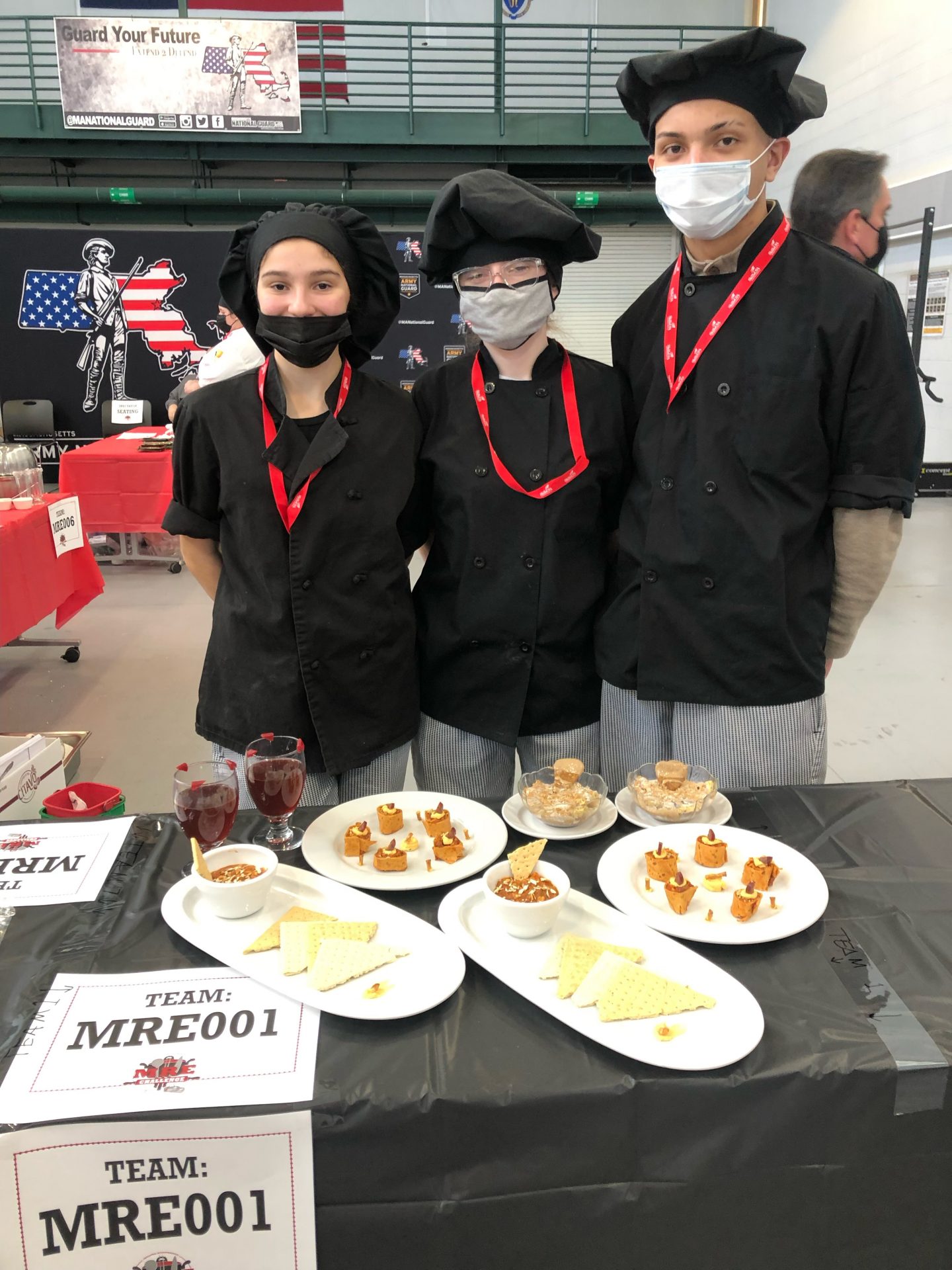 GNBVT Culinary Students standing by their final products for the MRE Challenge