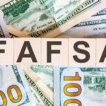 Wooden cubes with the abbreviation Free Application for Federal Student Aid FAFSA.Business