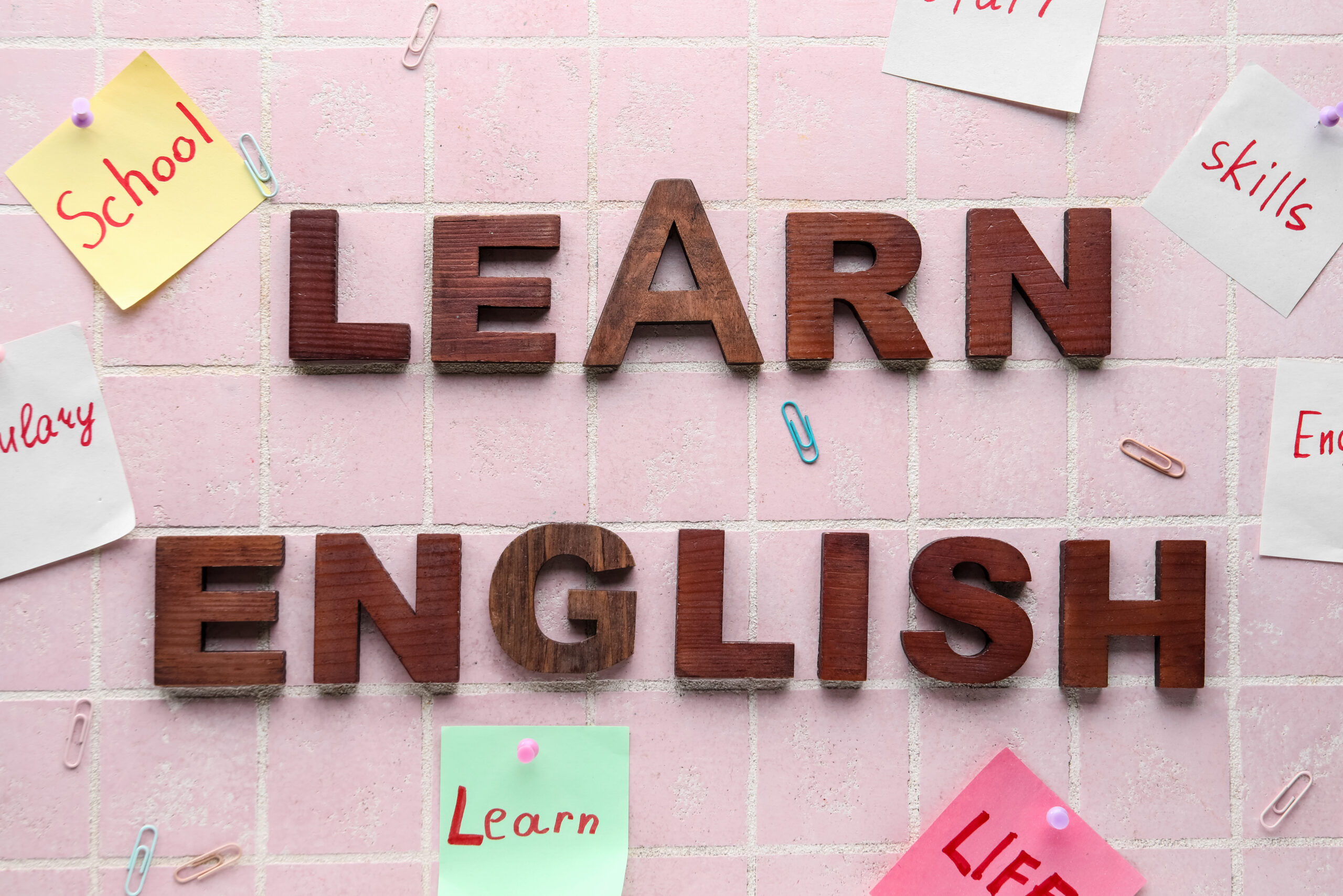 Pink background text saying learn english