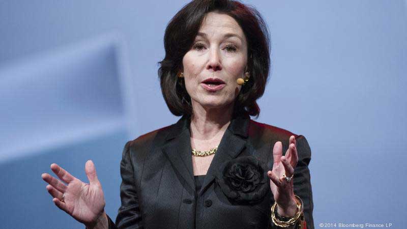 Safra-Catz2-COMPRESSED Safra Catz in black suit with flower